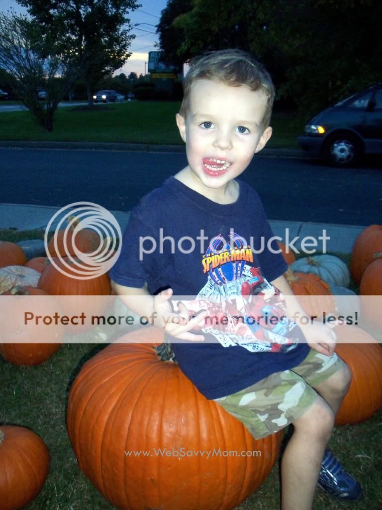 Troy sitting on The Great Big Pumpkin