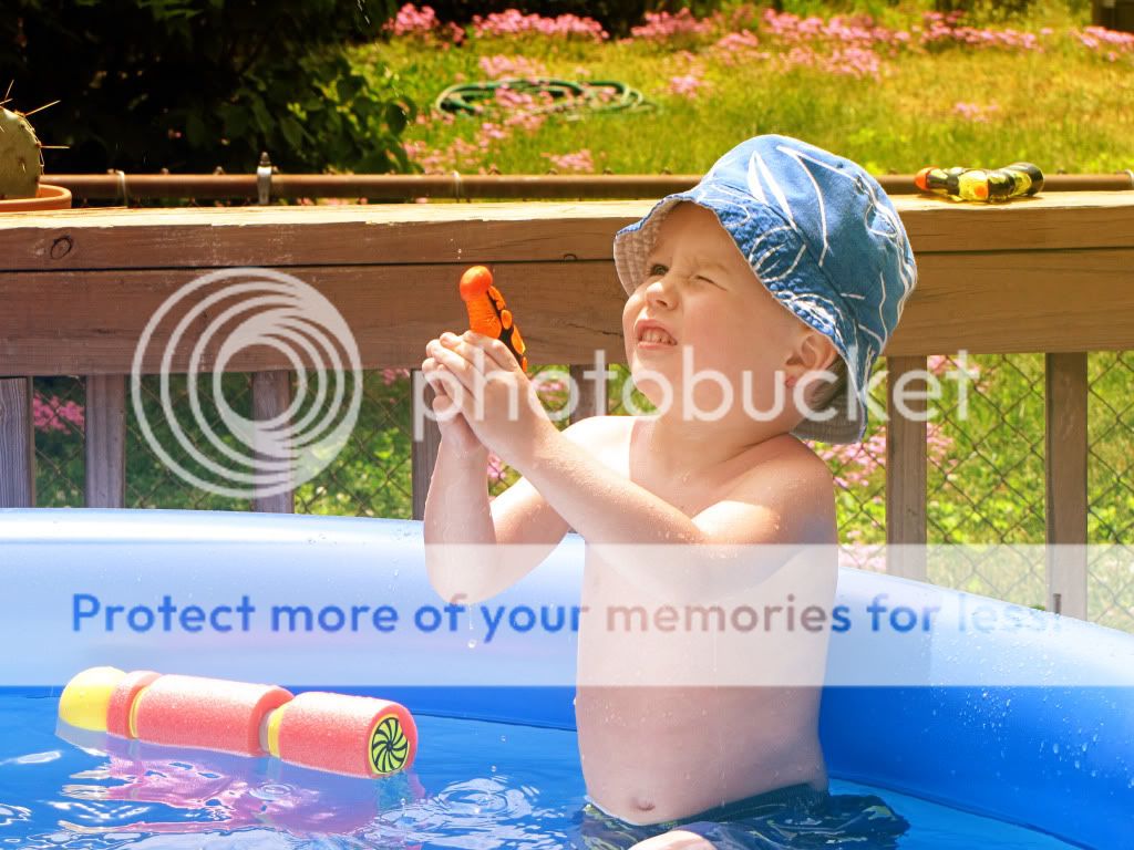 Troy in pool, fun with photoshop actions
