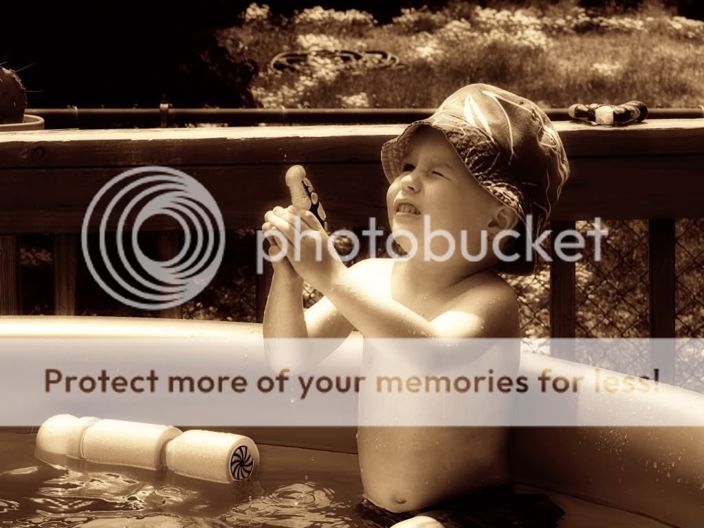Troy in pool, fun with photoshop actions