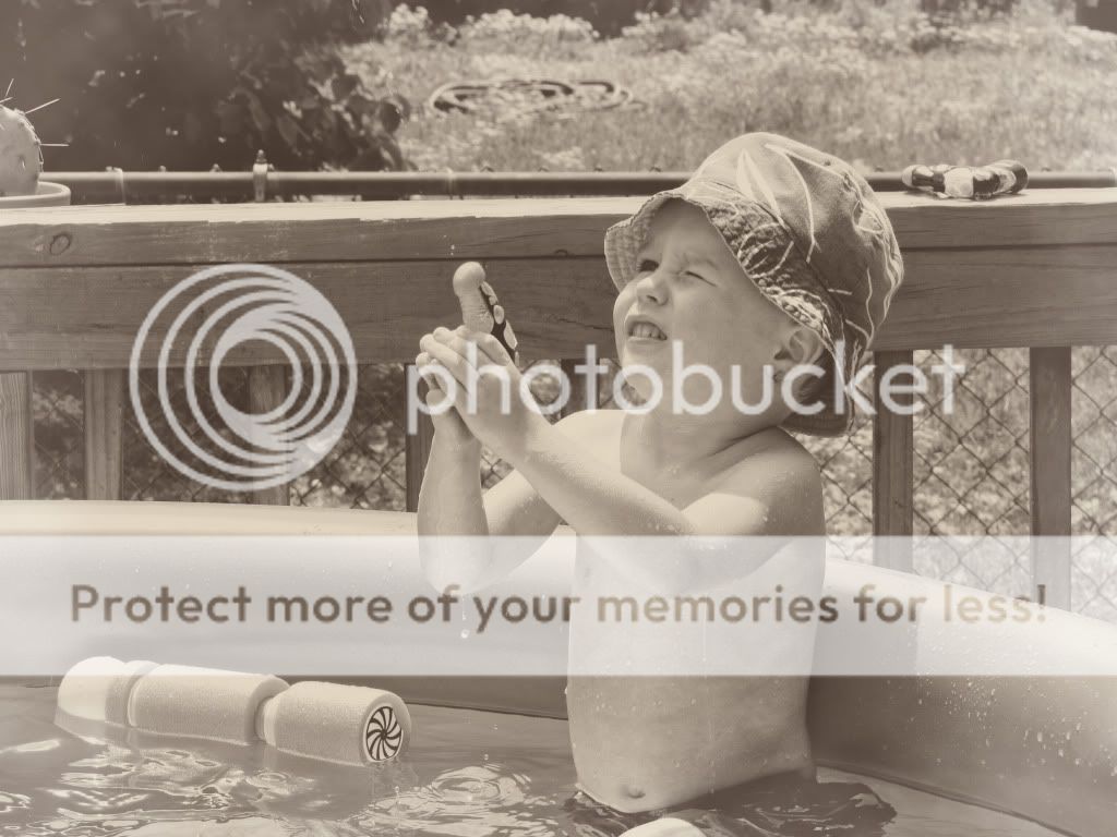 Troy in pool, fun with photoshop actions