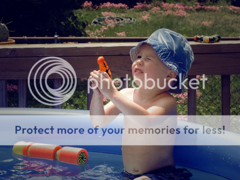 Troy in pool, fun with photoshop actions