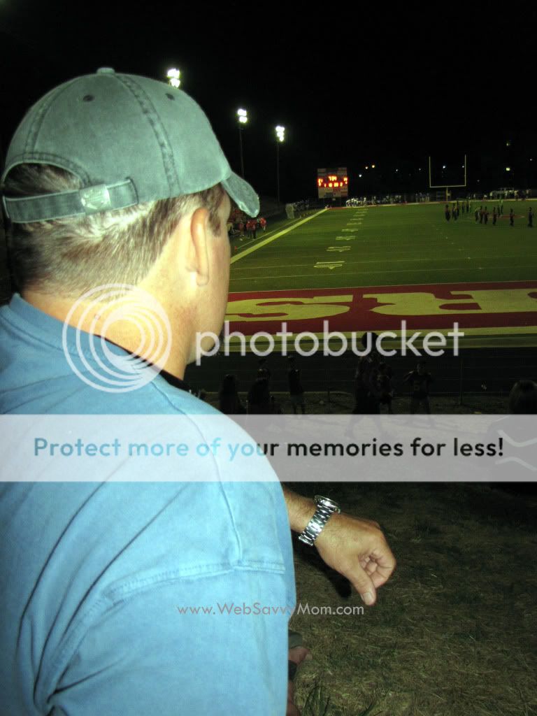 Tim watching Cary play football - September 2010