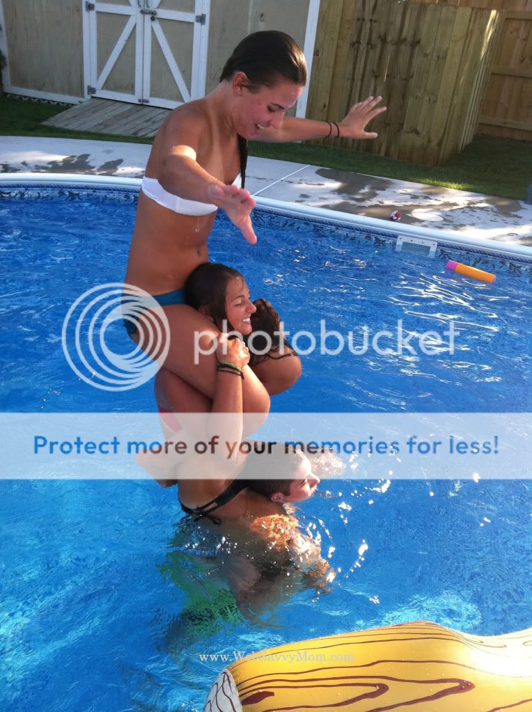 Three kids in pyramid in water - July 2011